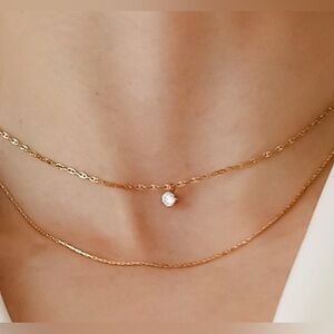 Elegant Gold Necklace with Crystal Pendant